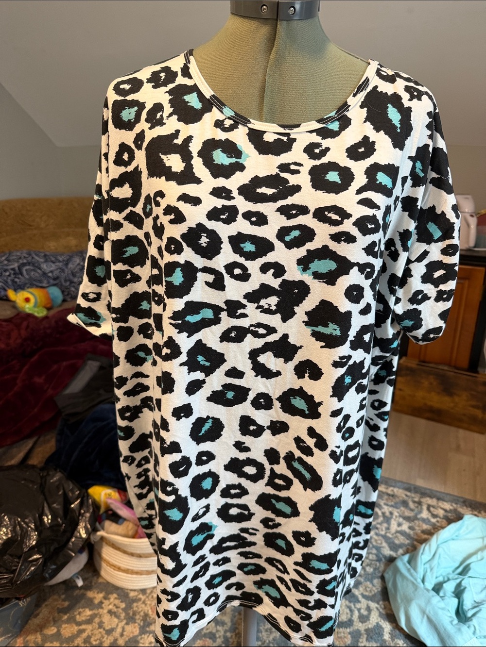 LuLaRoe Irma White Short Sleeve Tunic with Black and Teal Leopard Spots